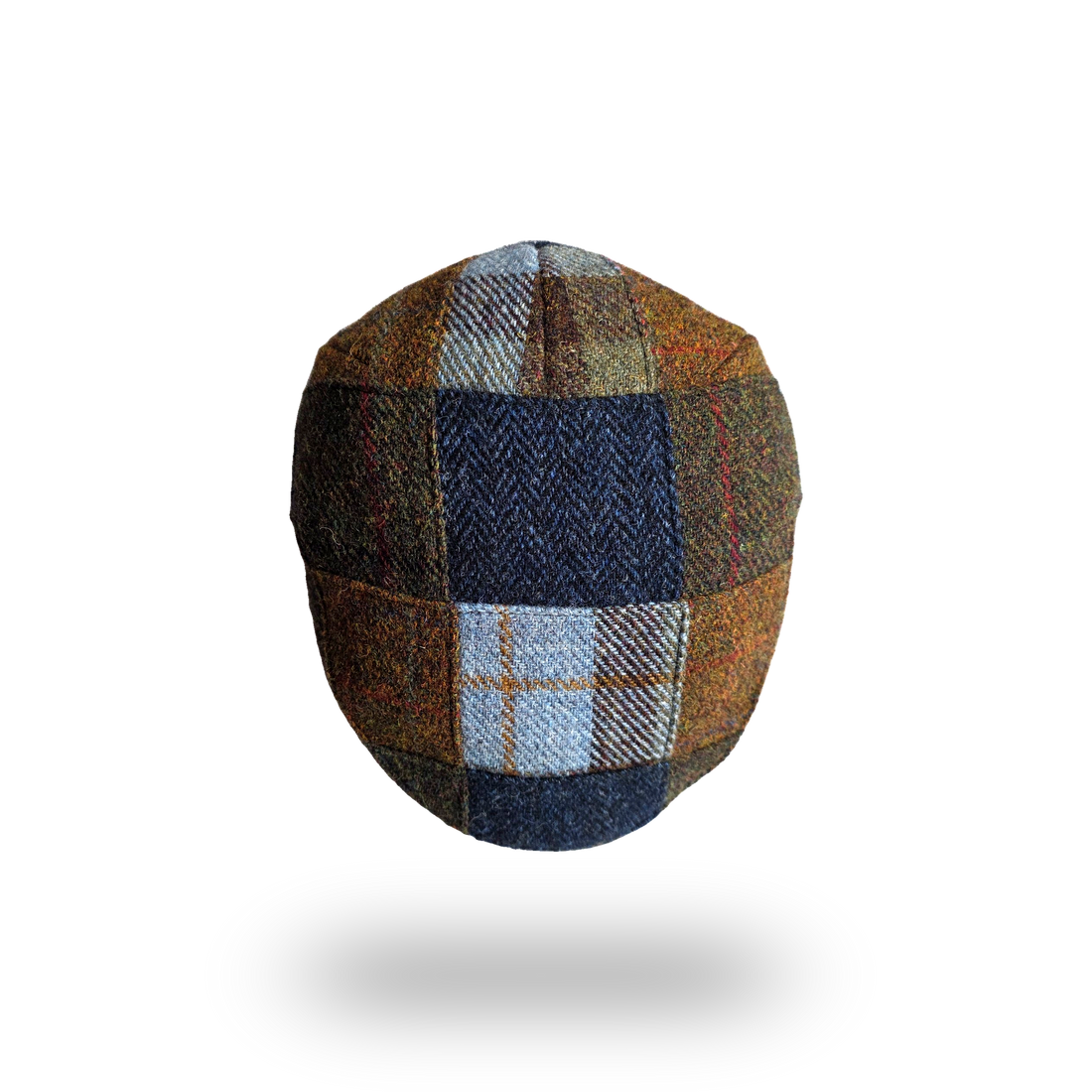 Patchwork tweed flat cap, top view of the patchwork panels