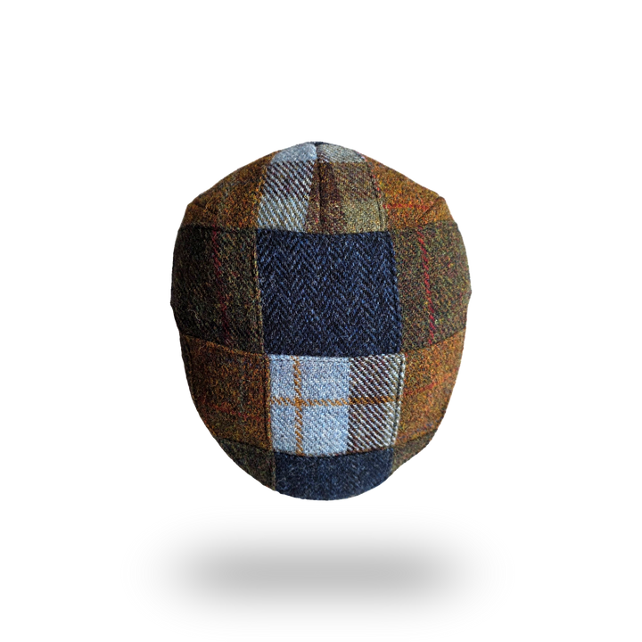 Patchwork tweed flat cap, top view of the patchwork panels