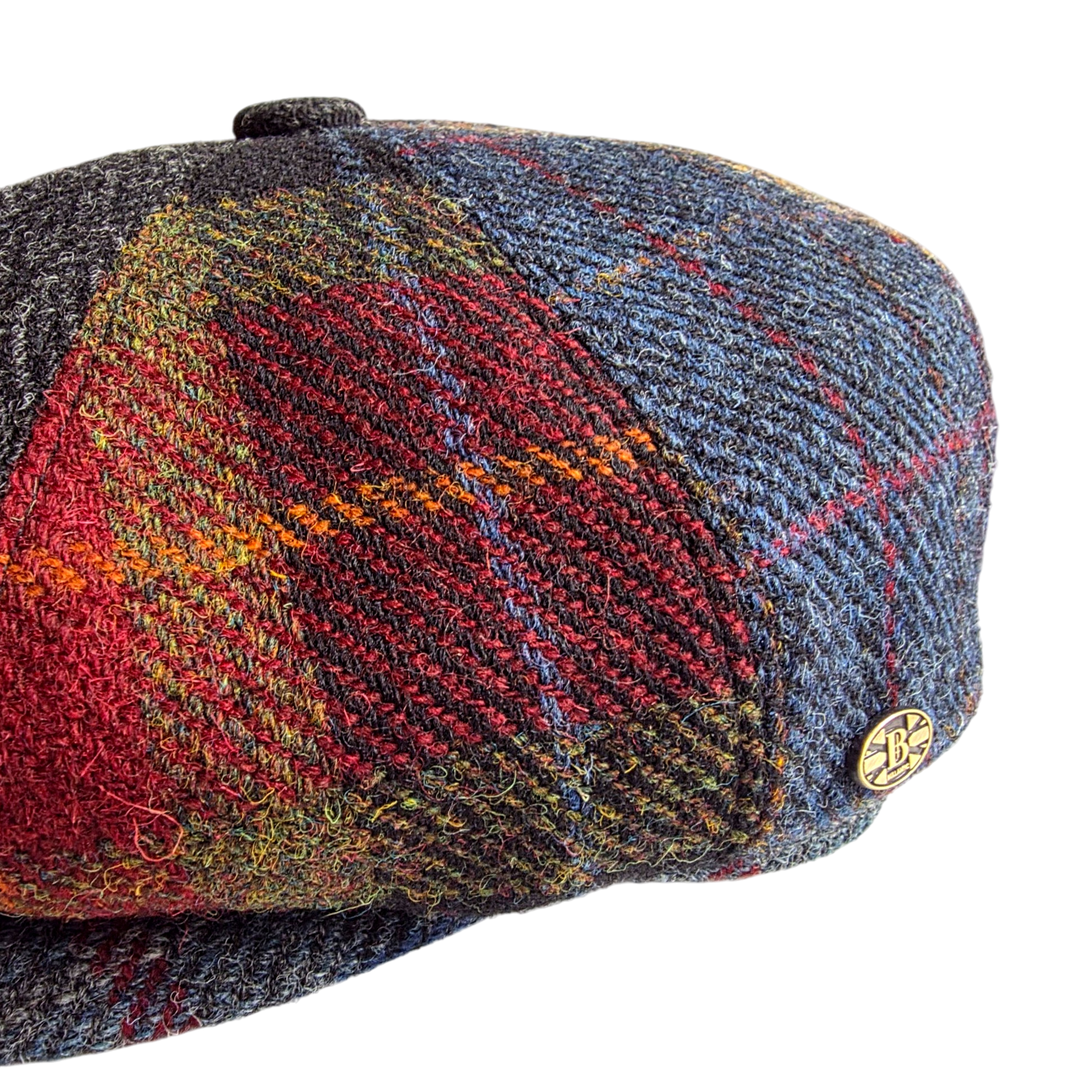 Close-up of the red tartan and blue tweed patchwork panels