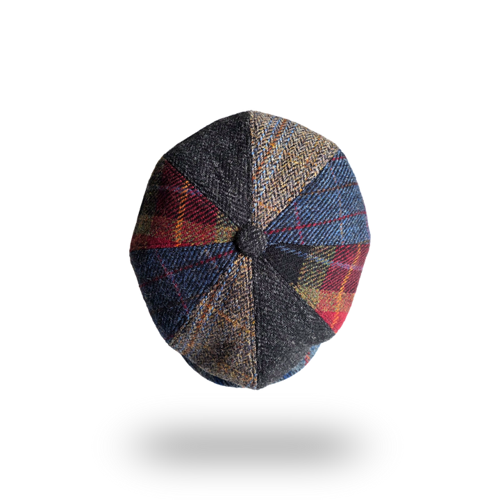Patchwork tweed newsboy cap, top view showing eight panels and button